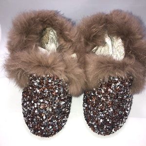 Fur and rhinestone slippers